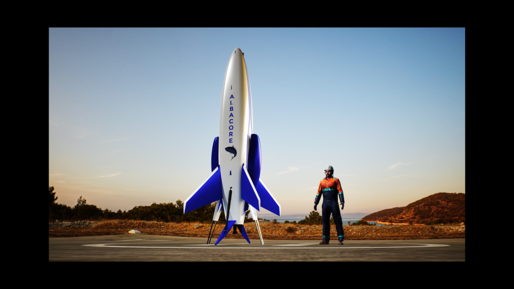 A metallic jet engine model is mounted on a test stand with visible tubing, wiring, and a